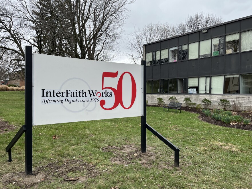 A newly erected sign celebrates the organization's 50th anniversary.