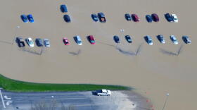 Parked cars in Tipton during the flood of 2013.