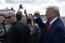 President Trump greets supporters after arriving at Florida's Ocala International Airport on Thursday to give a speech on health care at The Villages retirement community. In his speech, Trump gave seniors a pep talk about what he wants to do for Medicare, contrasting it with plans of his Democratic rivals.