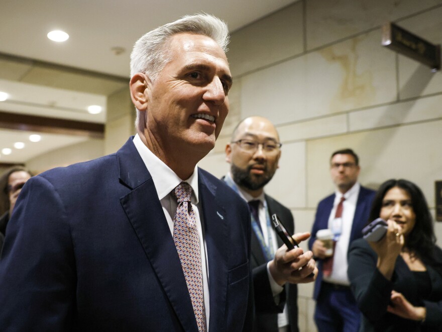 House Minority Leader Kevin McCarthy (R-CA) is followed by reporters as he arrives to a House Republican Caucus meeting at the Capitol on Nov. 14, 2022.