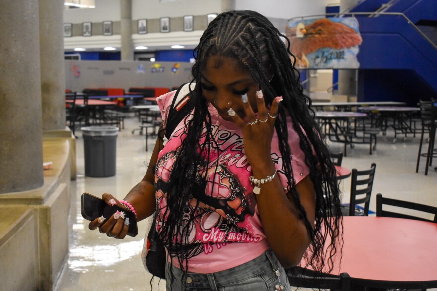 Sa'Niyah Mullins, a sophomore at Central High, color-coordinated her pink, blinged-out look for the first day of school.