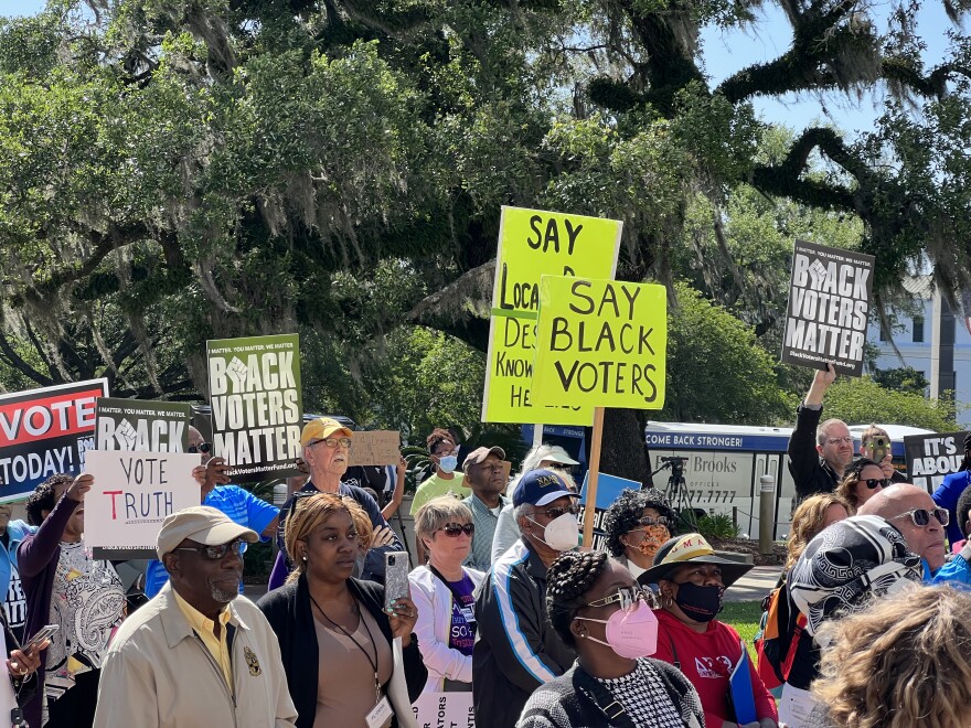 Opponents to Gov. Ron DeSantis' U.S. House map rally outside Florida State Capitol on Tuesday morning before lawmakers convened in a special legislative session to pass a new congressional map.