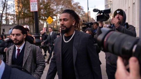 Cleveland Guardians baseball player Emmanuel Clase, center, leaves Brooklyn federal court, Thursday, Nov. 13, 2025, in New York.  