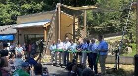 Zoo officials attended the ribbon-cutting ceremony Thursday, celebrating the zoo's new exhibit.