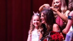 Ellie Stafford of Jonesboro, Miss Arkansas State University 2019, receives her crown from Cori Keller of Stuttgart, her predecessor.