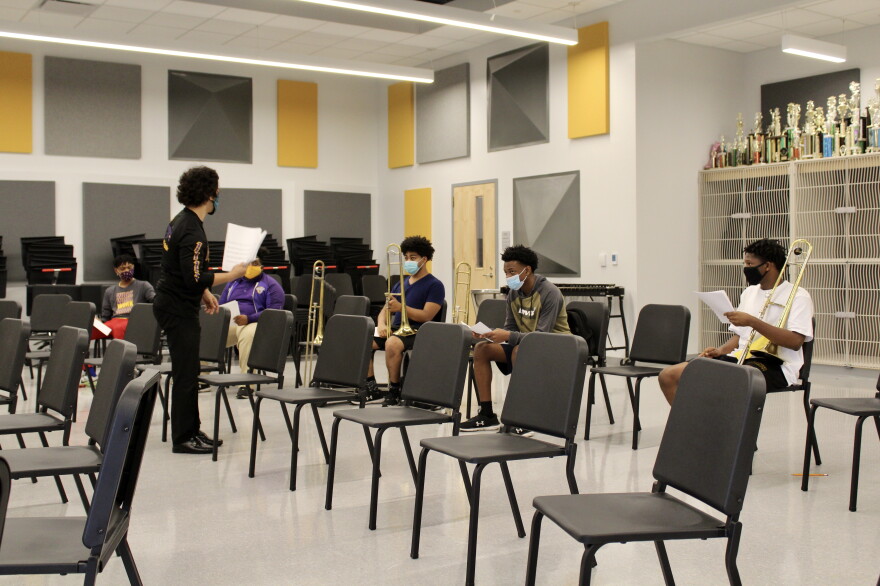 Band director Chris Herrero leads trombone practice at Edna Karr High School. Oct. 27, 2020.