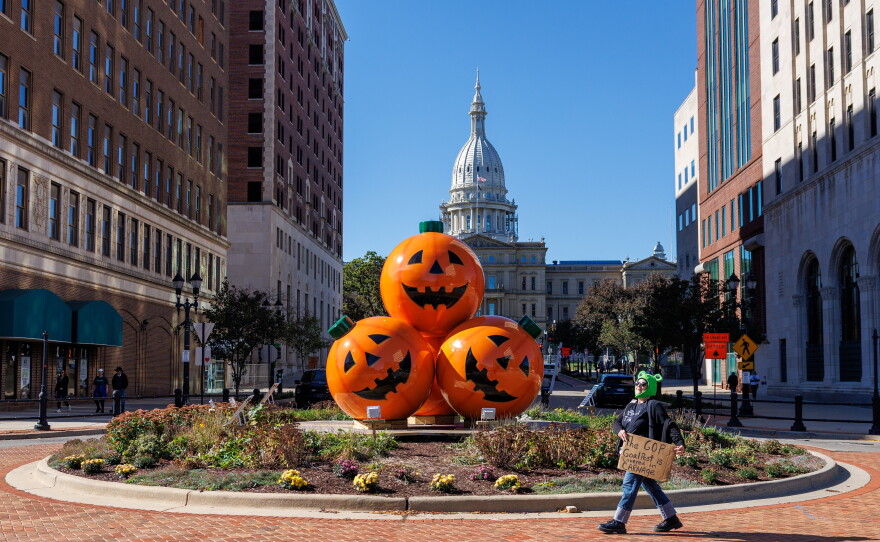 Laura Harms marches in downtown Lansing, Mich., for the fourth No Kings rally on Oct. 17, 2026.