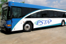 A blue and white bus with PSTA written on the side