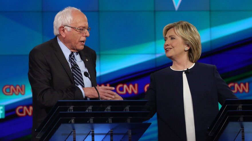 Bernie Sanders and Hillary Clinton take part in the first Democratic presidential debate on Oct. 13, 2015 in Las Vegas, Nev.