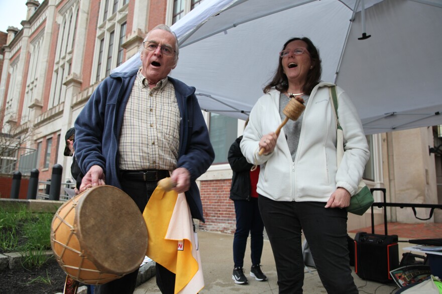  Paul and Denise Pouliot sing at a workers rights rally in Manchester.