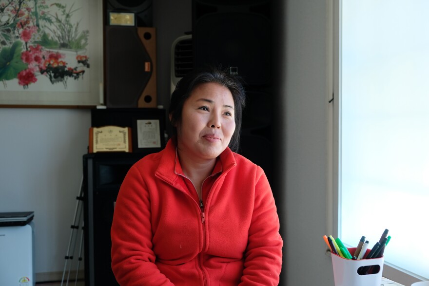 Lee Ye-joo, a defector from North Korea, speaks during an interview at her home in Chungnam Province, South Korea. She worked as a fortune teller in the North, where, she says, "the only people who seek out fortune-tellers are those with money, like big-name officials. They usually ask when they might lose their job or who their children should marry." She is training to be a shaman in the South.