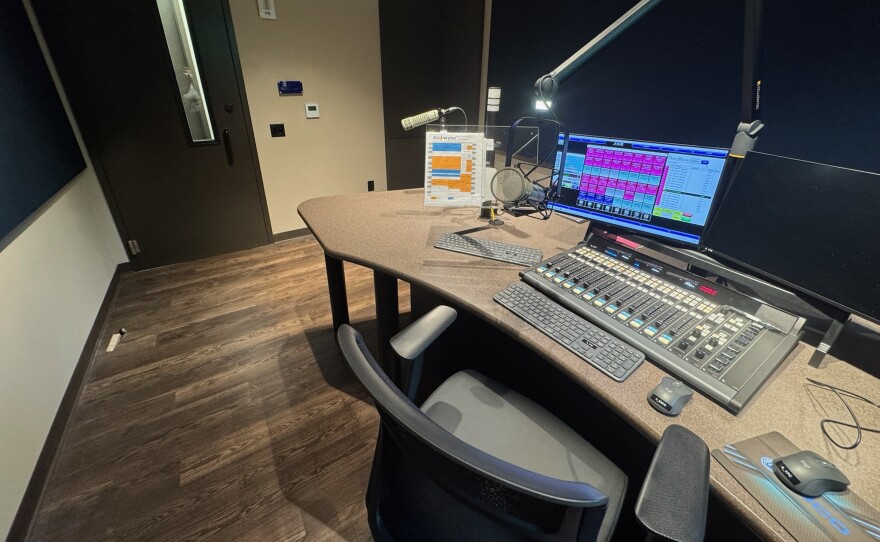 The Carol Pierson Editing Suite. All studios are acoustically isolated with floating slabs, treated walls, and no straight corridors. Hallways in the new wing zigzag, which is not a quirk of layout, but acoustic engineering: a bend breaks the path sound travels between rooms.
