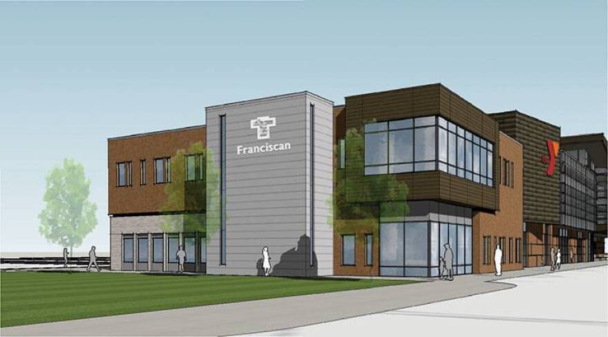 Franciscan St Francis will move into a building right next door to a new YMCA in the City Way development.