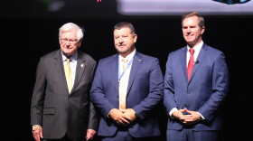 From left, U.S. Rep. Hal Rogers, Shaping Our Appalachian Region Executive Director Reed Adkins and Kentucky Gov. Andy Beshear present federal grants to Eastern Kentucky communities at a Corbin event.