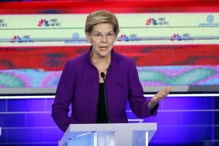 Sen. Elizabeth Warren speaks during the Democratic presidential debate on June 26 hosted by NBC News. According to campaign reports from the last three-month period, Warren raised more money than Sen. Bernie Sanders in that timeframe.