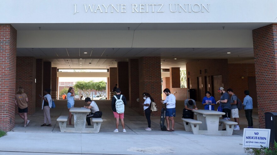 Voters wait outside of the J. Wayne Reitz Union at the University of Florida on Tuesday, Nov. 8, 2022, in Gainesville, Fla. (Javier Palacios/WUFT News)