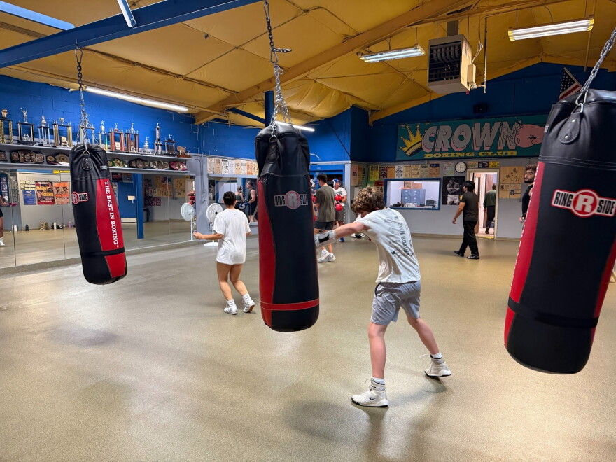 Valdez swings a left hook on his turn with the punching bags (Lansing, Sept. 21, 2026).
