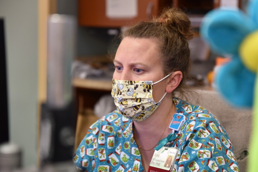 Amy Harvey works long days as a nurse in Sparrow's pediatric ED, where patient volumes are unusually high. The work often keeps her from getting home to see her own kids before they go to sleep. She's also a mentor to some of the "baby nurses," as new staff are called. "Everybody has their breaking point," she said.