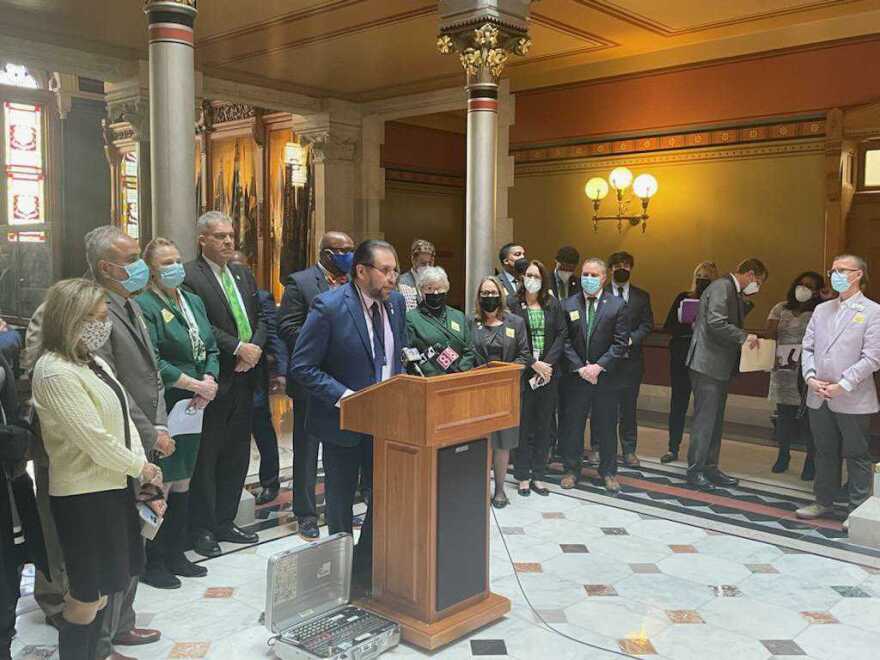 State Representative Robert Sanchez at the state Capitol in Hartford discussing expanding funding and resources for child care in Connecticut.