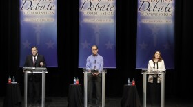 Sen. Joe Donnelly (D-Ind.), left, Republican Mike Braun, center, and Libertarian Lucy Brenton, right, debate for the second and final time in Indiana's 2018 U.S. Senate race.