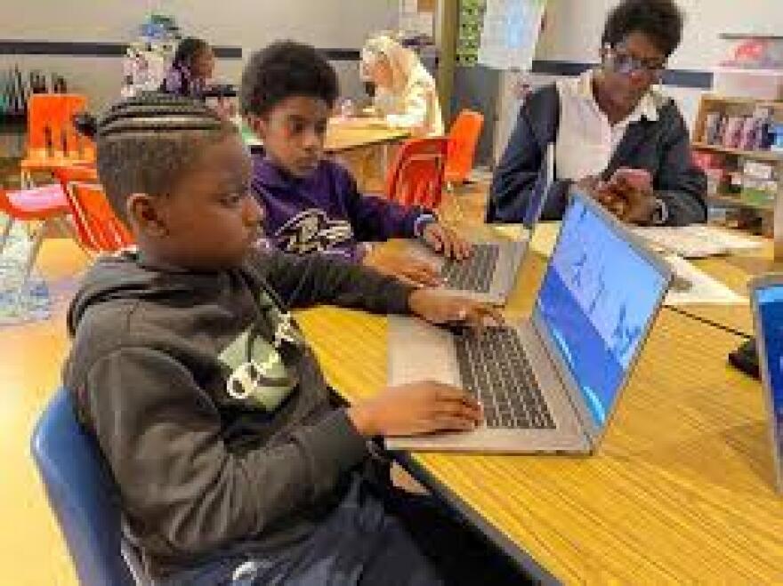 Children learn computer skills at Cambridge Empowerment Center
