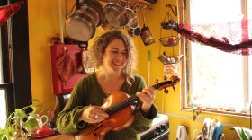 Alex Guy stands in the kitchen of her South Lake Union apartment, one of the last affordable apartments in the neighborhood.
