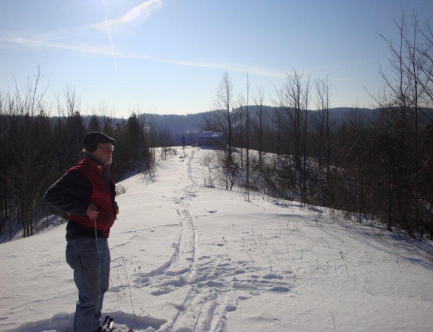 Steve Smiley, project manager for the Northport turbine, on the ridge where the windmill will be built.
