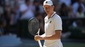 FILE - Jannik Sinner celebrates a point at the Wimbledon Tennis Championships in July 2026. Due to a knee injury, Sinner has withdrawn from the US Open.