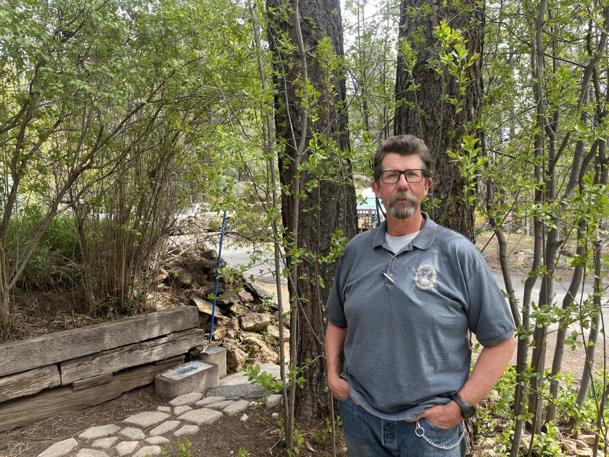 Former Highlands Fire Chief Dirch Foreman poses outside his home in Mountainaire, March 30, 2026.