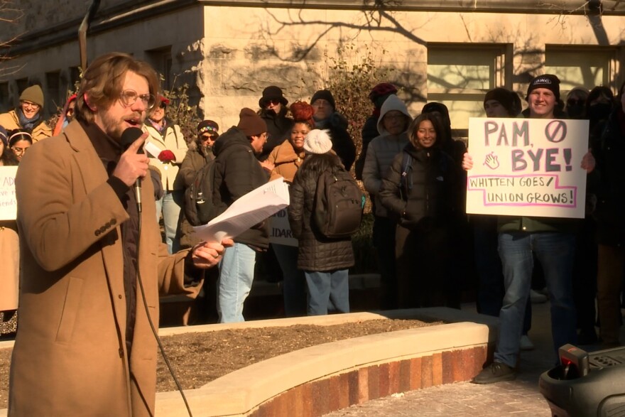 The Indiana Graduate Workers Coalition gathered at the Sample Gates Dec. 6 to kick off the "Whitten Goes, Union Grows" campaign.
