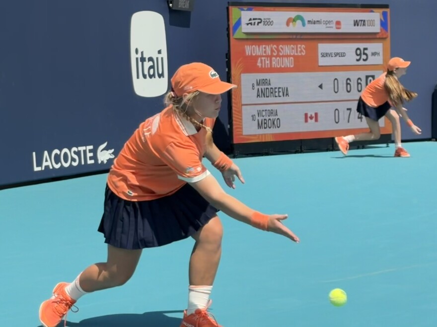 Alyssa Kuteneva, 14, rolls a ball across the court during a match featuring Russian player Mirra Andreeva and Canadian player Victoria Mboko at Hard Rock Stadium in Miami Gardens on March 23, 2026.