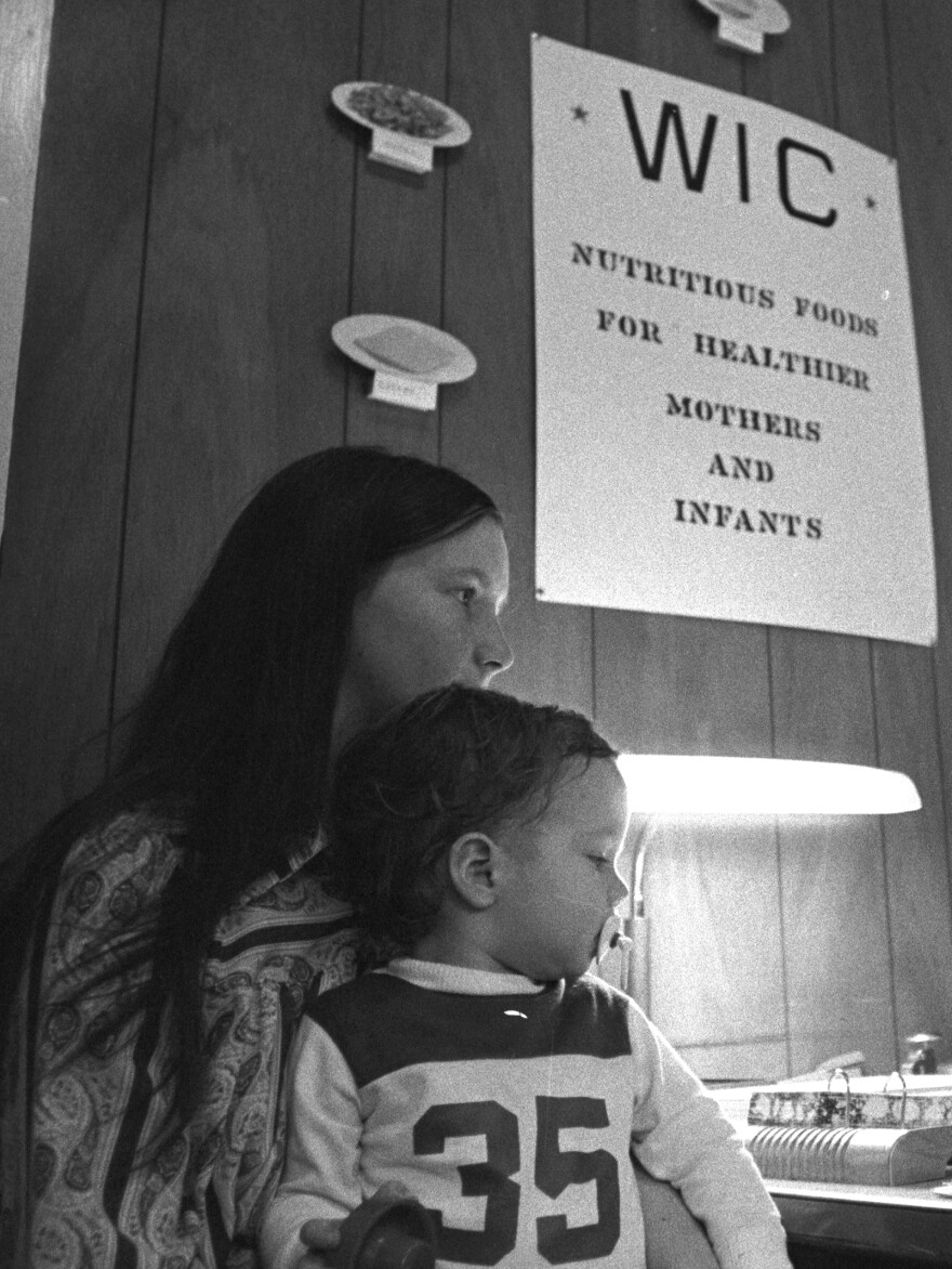 woman and child in a WIC office