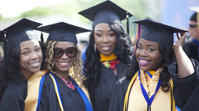 Celebrating graduation at a recent Morgan State University commencement.