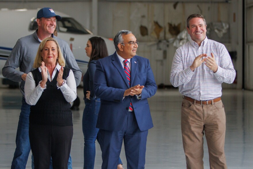 From left to right, Congresswoman Ann Wagner, Missouri State Treasurer Vivek Malek, and Attorney General Andrew Bailey clap as Josh Hawley gives a speech at Spirit of St. Louis Airport in Chesterfield on Nov. 4, 2024.