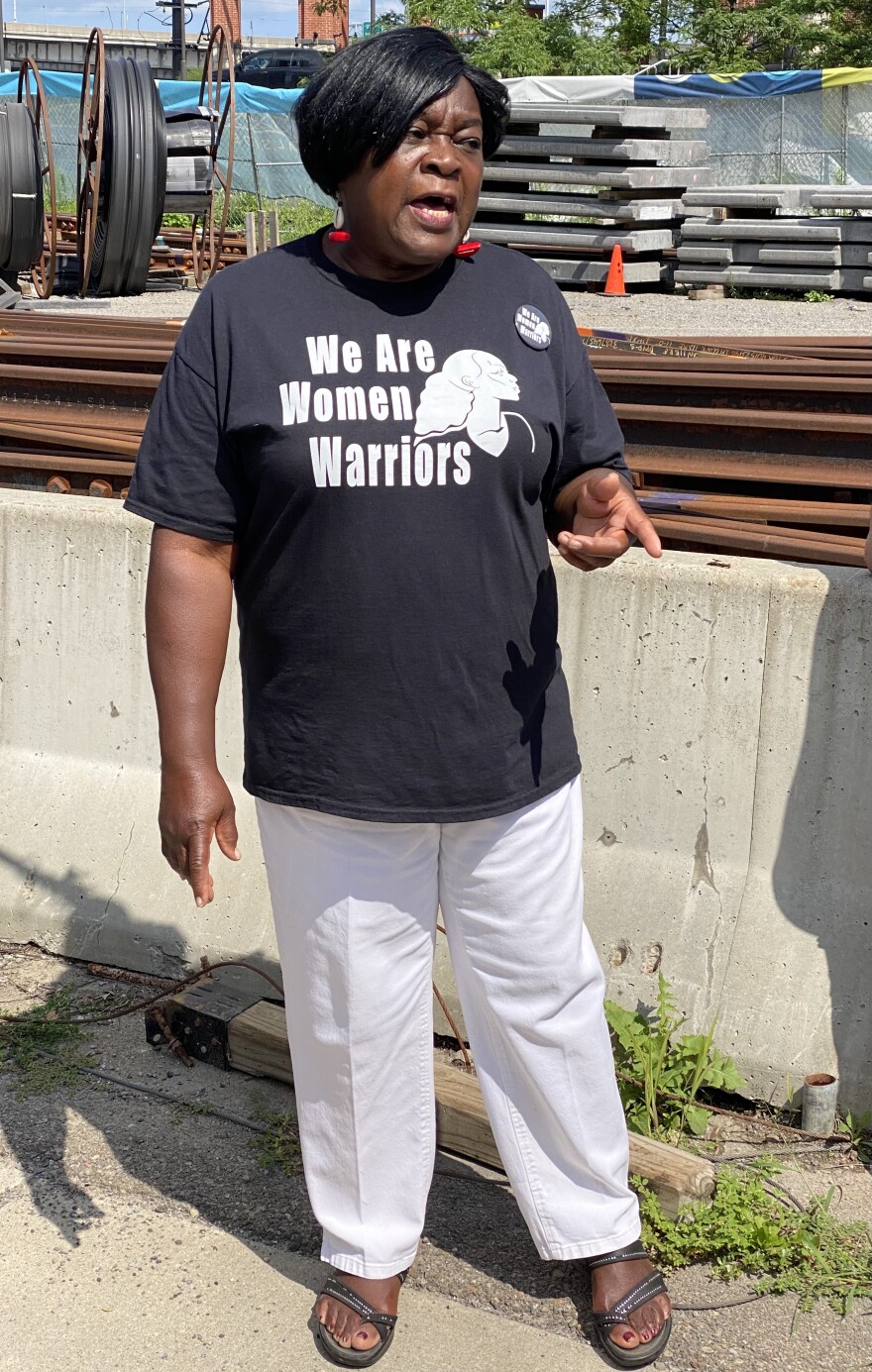 Betty Jean Grant protests outside of the Buffalo News