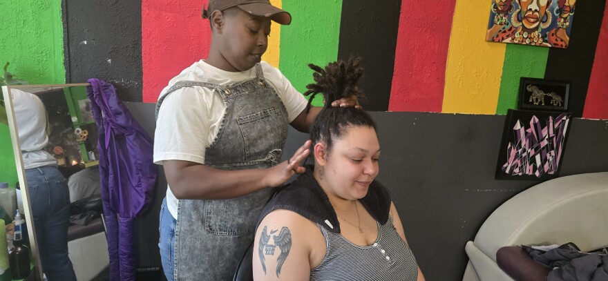 Purpose Simba styling Asiah Price's hair.