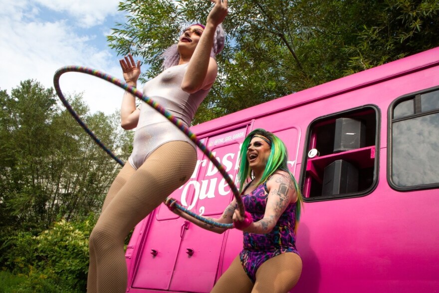 Gigi Gabor (left) and Cherry Lemonade perform a hula hoop gag.