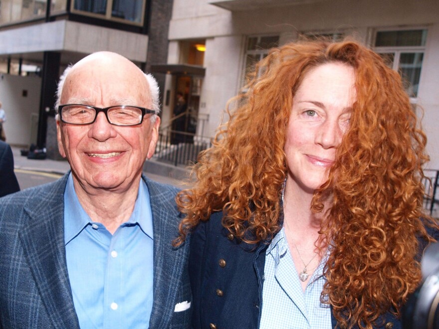 Rupert Murdoch (left) and Rebekah Brooks. Brooks resigned as head of Murdoch's News International on Friday.