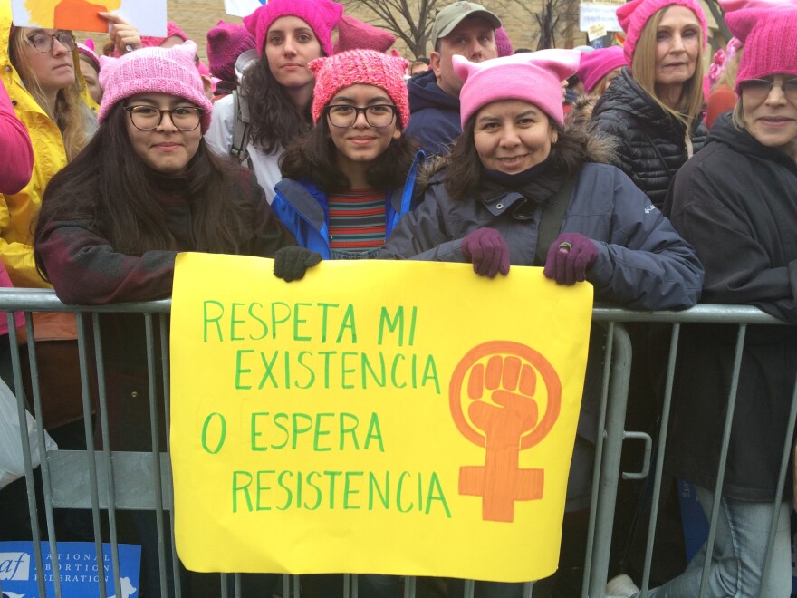 Erika Abril (R) and daughters Maria Emilia Proano, 18 (L) and Maria Paula Proano, 16 (Center) at the Women's March Saturday.