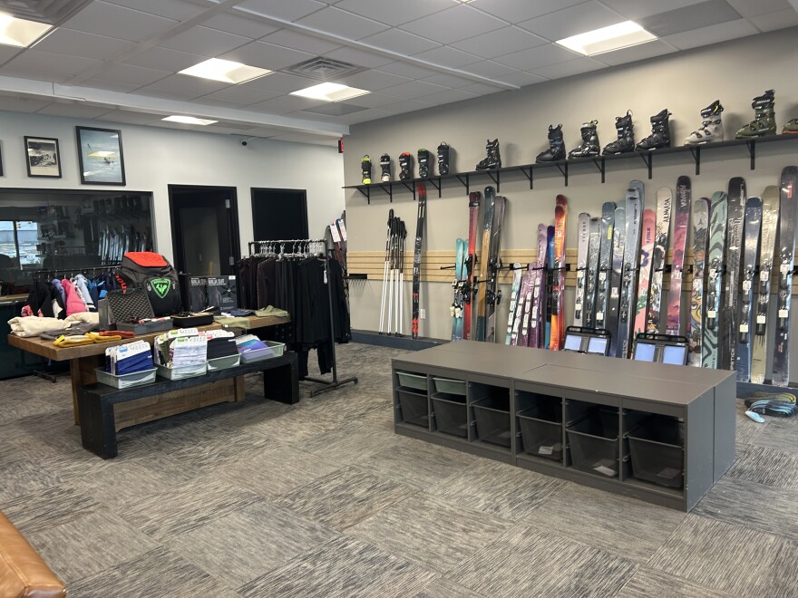 Ski and snowboarding apparel displayed inside the shop.