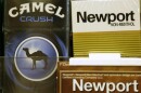 Camel and Newport cigarettes are displayed for sale 