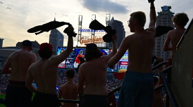 Fans participate in "tarps off" during the fifth inning of a baseball game between the Cleveland Guardians and New York Yankees, Tuesday, June 9, 2026, in Cleveland. 