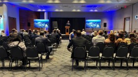 Grand Action 2.0 Co-Chair Dick DeVos speaks to Grand Rapids leaders and stakeholders at Van Andel Arena.
