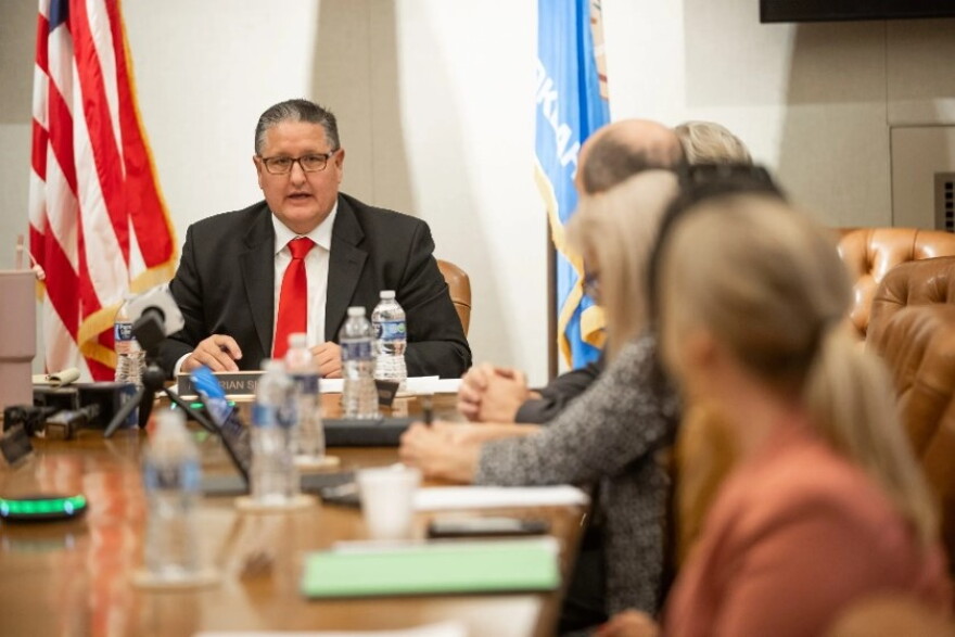 Statewide Charter School Board Chair Brian Shellem conducts the board’s Oct. 23 meeting.