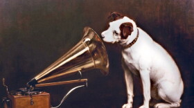 In England, artist Francis Barraud (1856-1924) painted his brother's dog Nipper listening to the horn of an early phonograph during the winter of 1898. Victor Talking Machine Company began using the symbol in their trademark, His Masters Voice, in 1900.