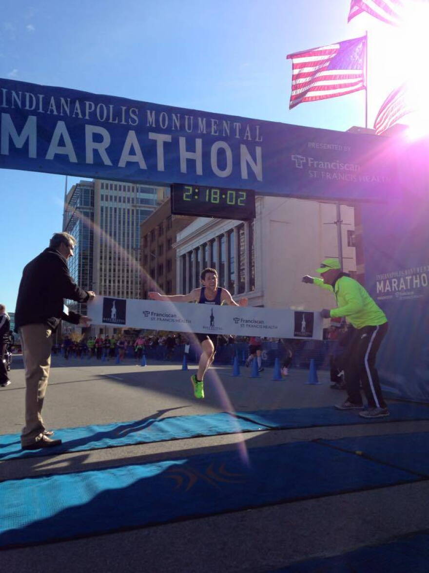 Jesse Davis crosses the finish line at the Monumental Marathon Saturday.