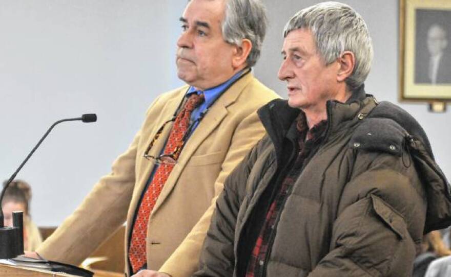 Tendzin Parsons, at right, was sentenced to a year in jail after pleading guilty in Northampton District Court January 5th, 2018. His lawyer, Stephen Ferrarone, stands with him.
