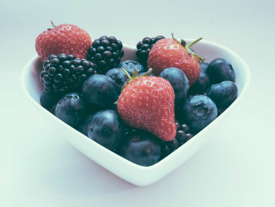 heart shaped bowl of fruit