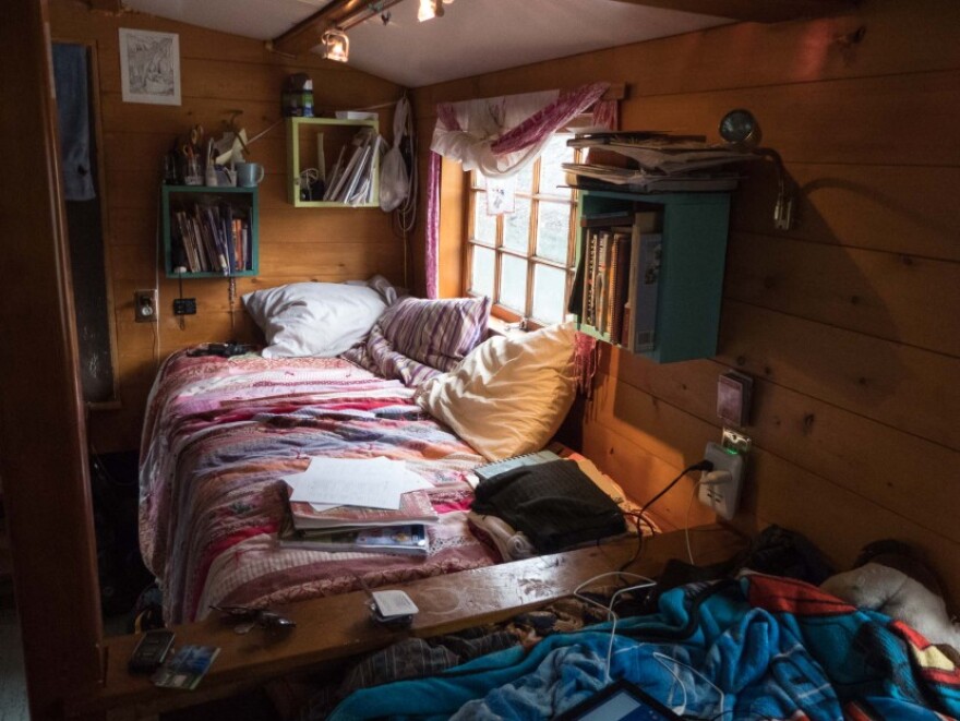 Carrie Joy and her son William’s bed against the wall. (Photo by David Purdy/KTOO)