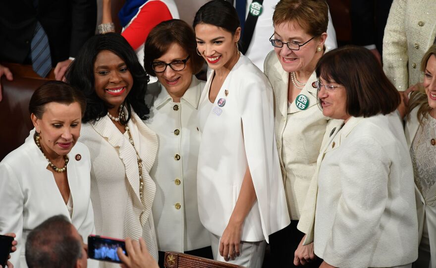 Rep. Alexandria Ocasio-Cortez, D-N.Y., poses for a picture with other women ahead of the State of the Union address.